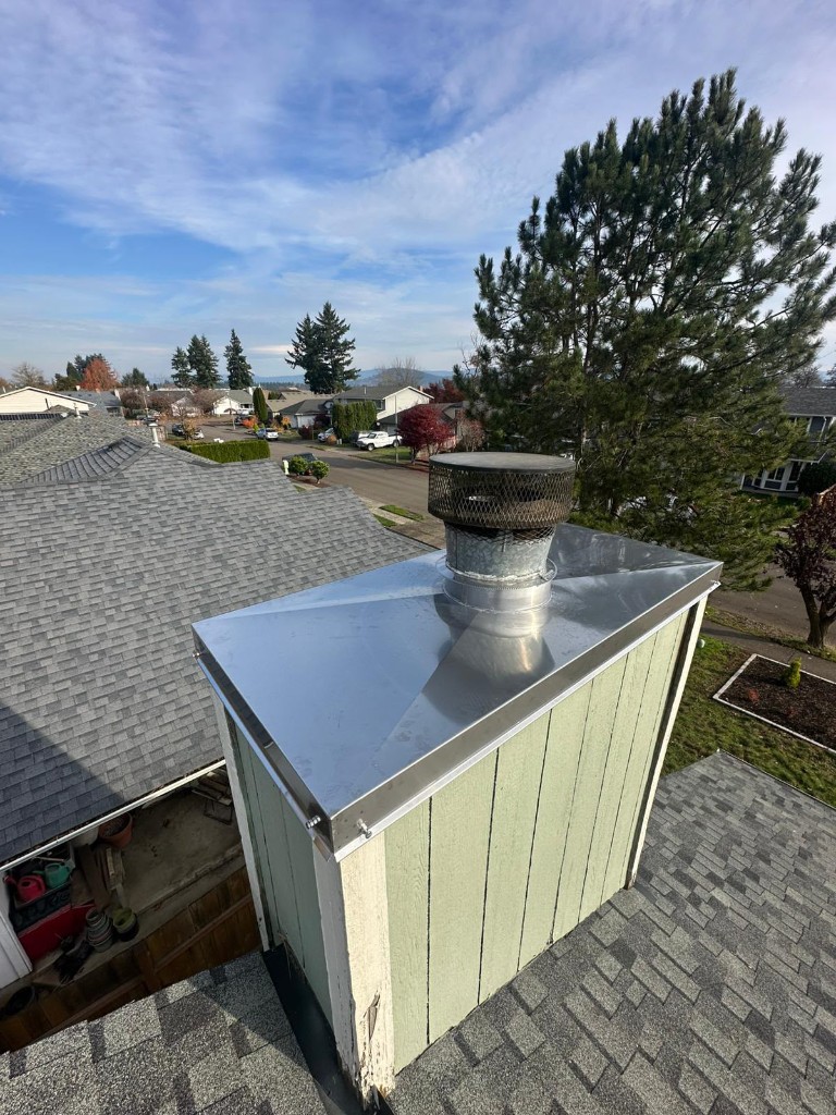 After: new stainless steel chase cover installed on a chimney chase in Portland, Oregon