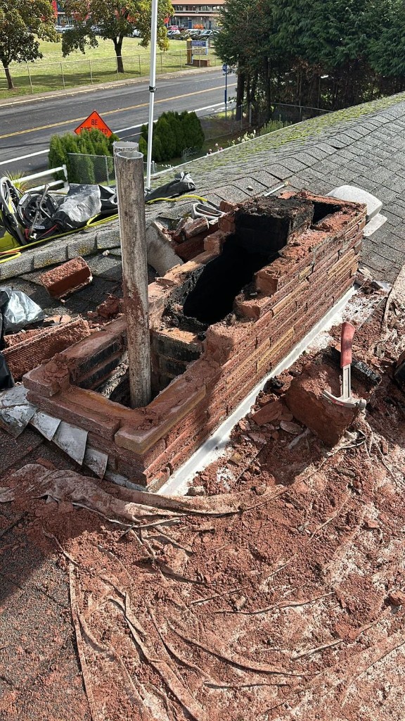 Before: damaged brick chimney rebuild in Portland, Oregon